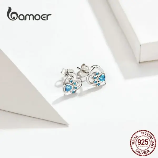 009de89e5dd578c6f098d598 Brincos Pegadas com Coração
