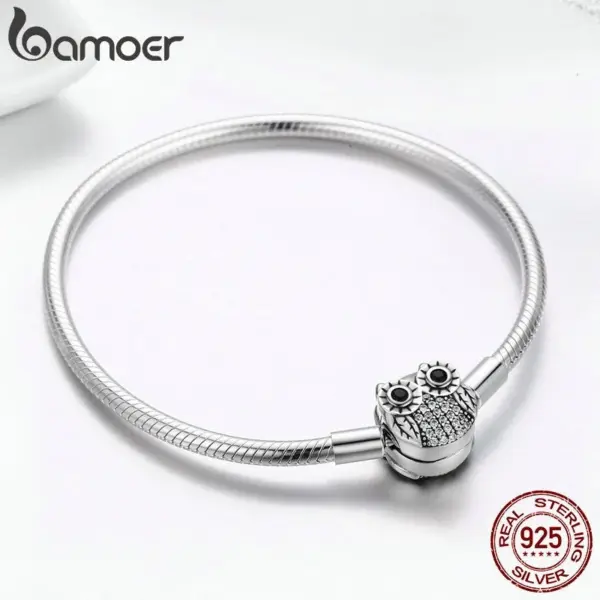 0a47ebd48f6ede9172426b00 Bracelete Corujinha