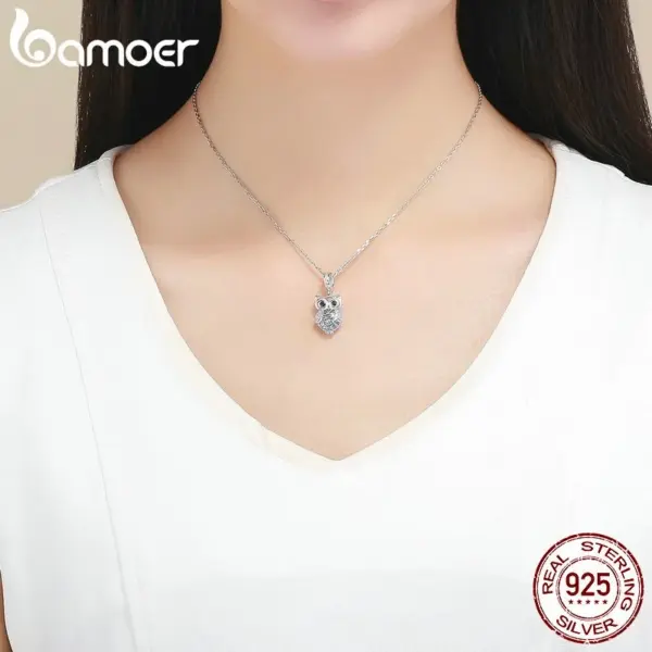 0ad69a91fbe17bbf131aa08b Pingente Coruja Azul