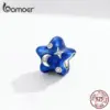 0f9c428a66c136316aef8884 Berloque Céu Azul Estrelado