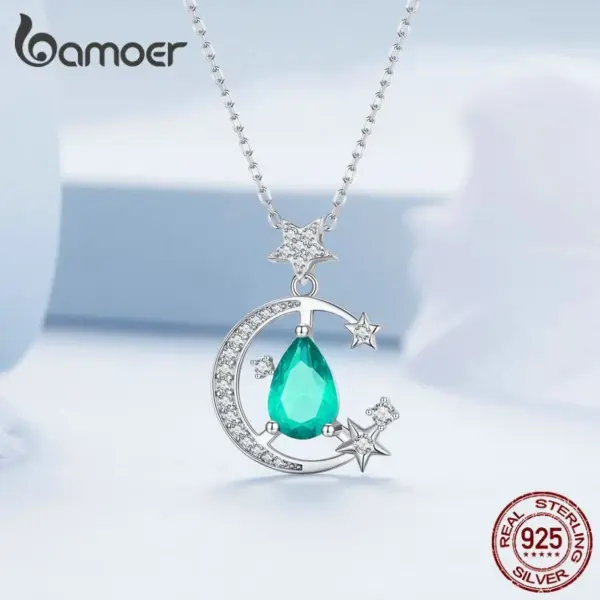14c08a3296fe5f677bef0c7a Colar com Pingente Estrela & Lua
