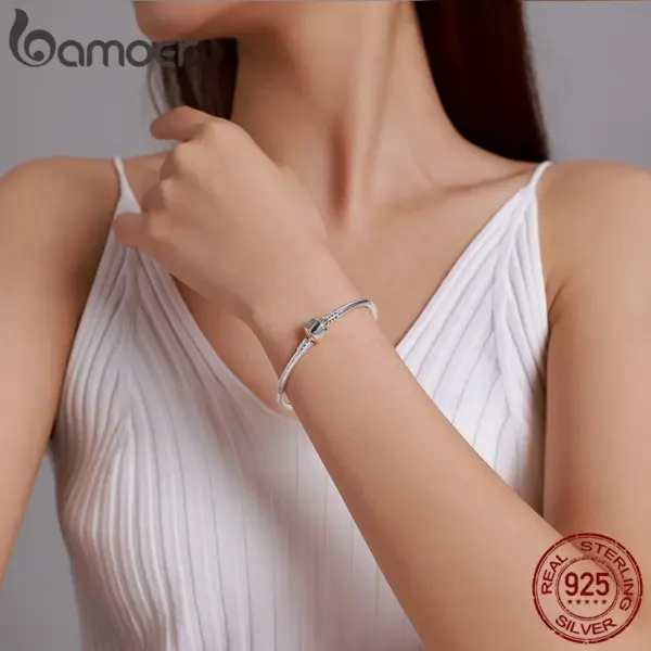 1fc4a8bc9d92d261277c4ed1 Bracelete Charme Básica