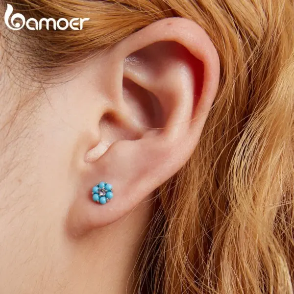 21a94fb5422249d695d5d9a0 Brincos Flor Turquesa