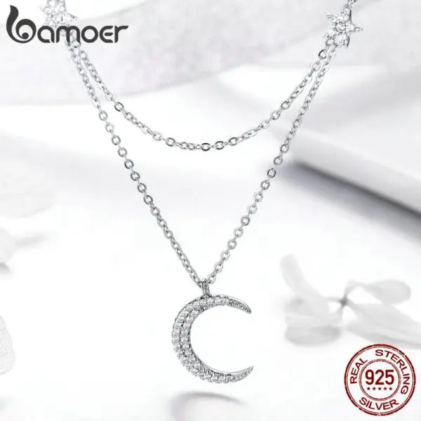 3a4890e44b8aacc3d3e99dfe Colar com Pingentes Lua e Estrelas