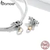 3d111367ae1b96aa0c9c3eb8 Berloque Pinhão da Sorte