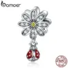 558c43f964e0a773e10fb679 Berloque Flor da Joaninha