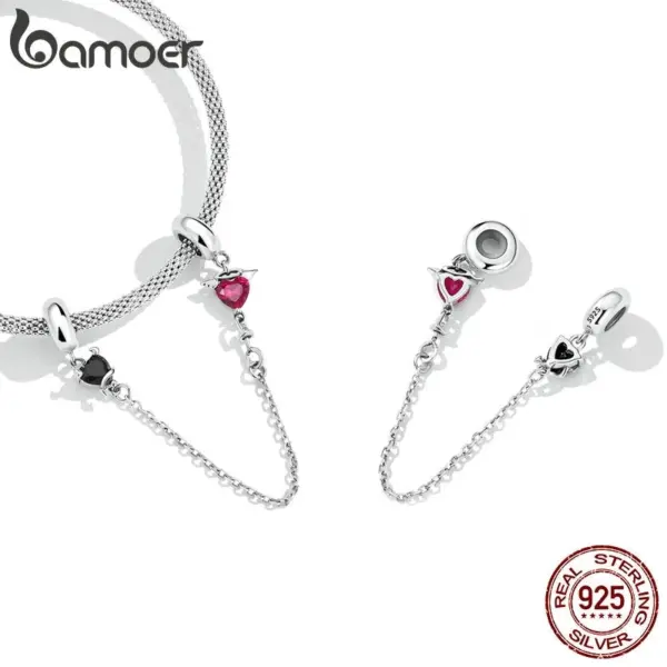 57189487c0ce5e3901b42cd7 Berloque com Corrente de Segurança Anjo Bom e Anjo Mau