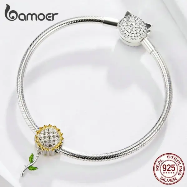 57fe01b88de8d3854a7fd10d Berloque Charm Girassol