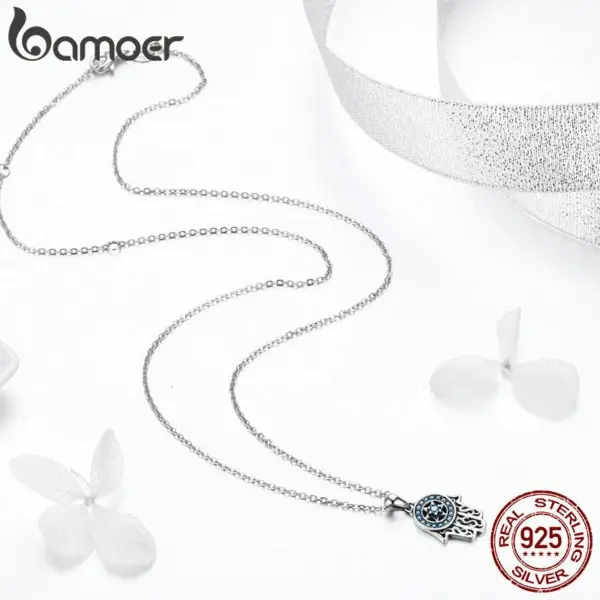 58b8794bdaf31333c5921e62 Colar com Pingente Mãos de Fátima