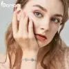 6097a99477f9283ae1b633bf Pulseira Olhos Azuis