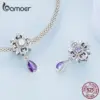 6113806920a5e4ed7b61bfc8 Berloque Flor de Lis
