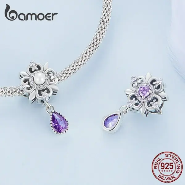6113806920a5e4ed7b61bfc8 Berloque Flor de Lis