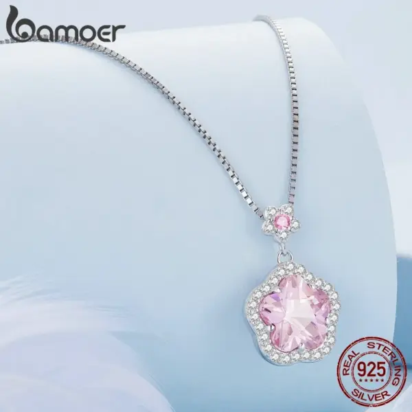 6505f7067d7c1299b65c0ced Colar com Pingente Flor Rosa
