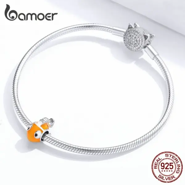 690dcdd004ce7a61062977ce Pingente Peixe-Palhaço