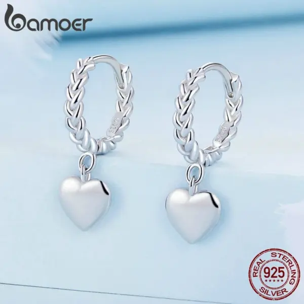 6a709e4d21ae74e9cc01cc2c Brincos Coração Entrelaçado
