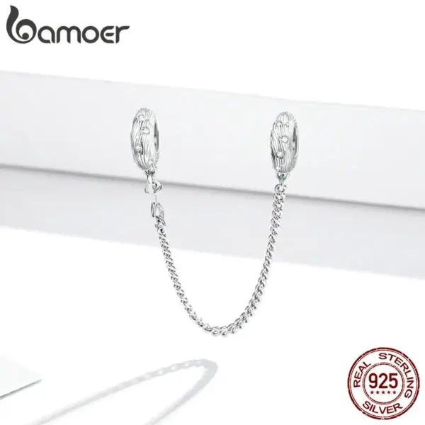 82261c10ef33440e73f898c1 Berloque com Corrente de Segurança Ondas do Mar