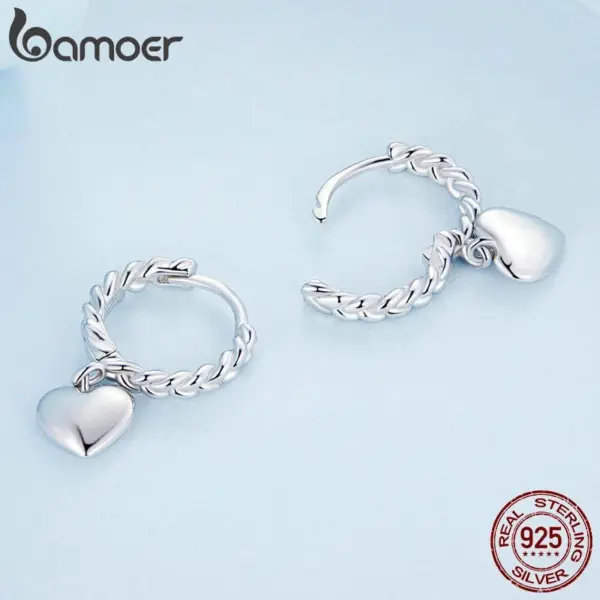 82ea81ec954916bc987d7703 Brincos Coração Entrelaçado