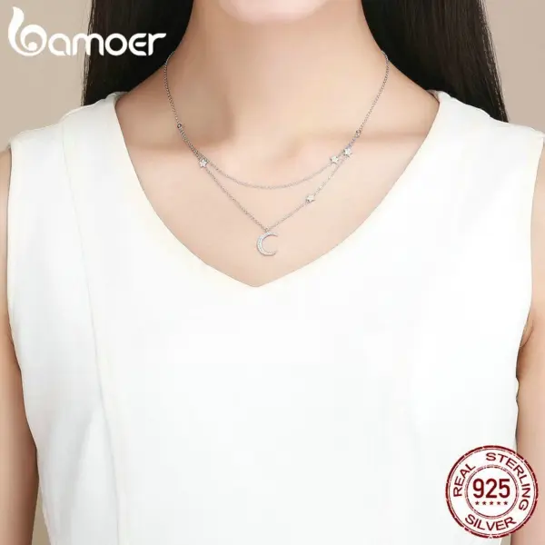 89aca51301c9a6a1392cc12b Colar com Pingentes Lua e Estrelas