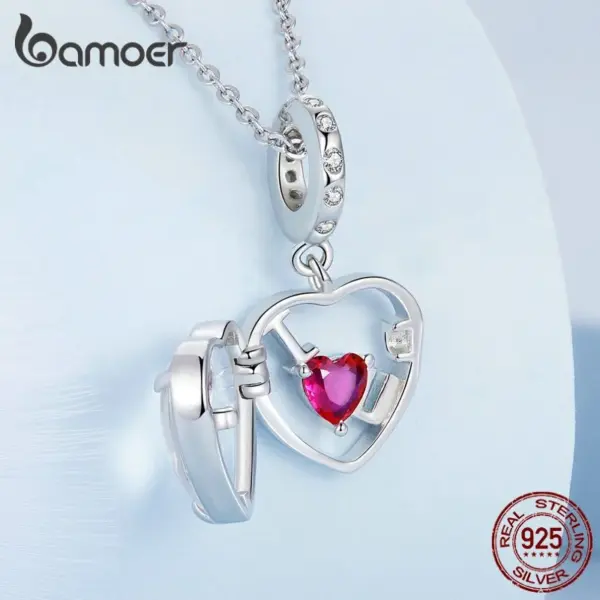 966494ba33ae5c72b949250f Berloque Amor Retrátil