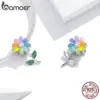 aaf41bcec8be0eeadb008366 Berloque Flor Colorida