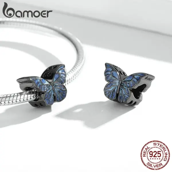b0d2b766ca353426a00a8fc2 Pingente Borboleta Negra Azul