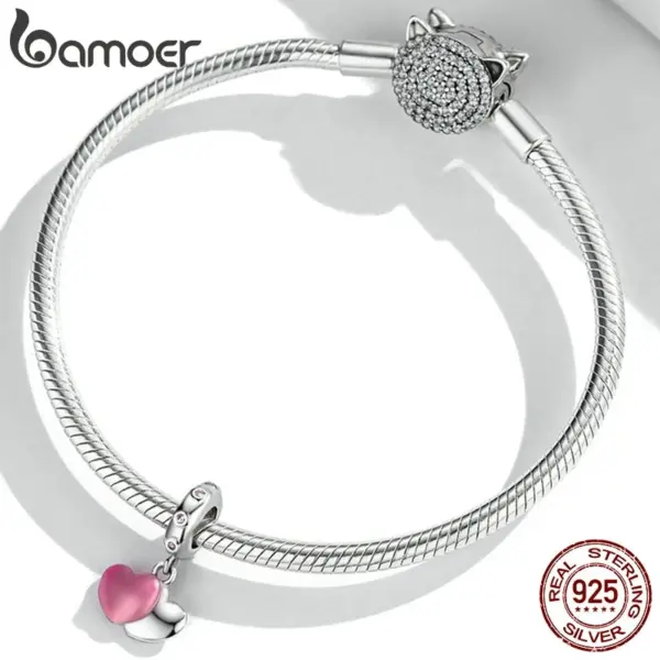 b36ee3673f95ef1264229bdf Berloque com Argola Duplo Amor