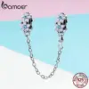 b584cc22ea0e9fbc9e1eea29 Berloque com Corrente de Segurança Flores Violetas