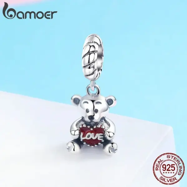 c289af5b2ca9c60311a13f9e Berloque com Argola Urso do Amor