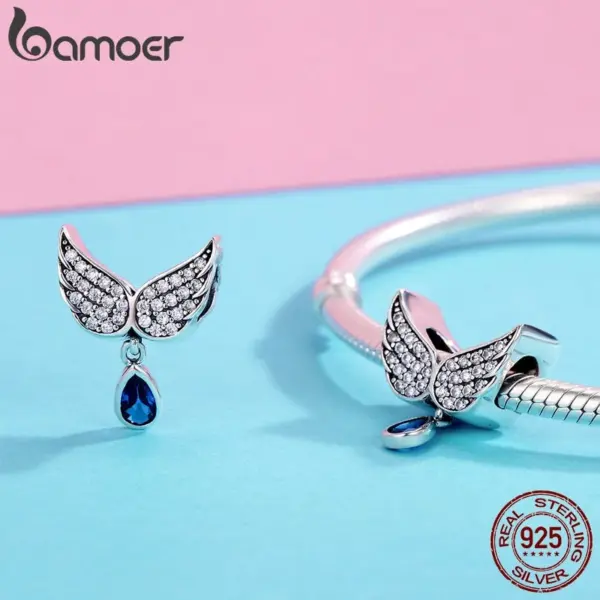 c3cc946ff2020c03372c15e9 Berloque Asas de Anjo