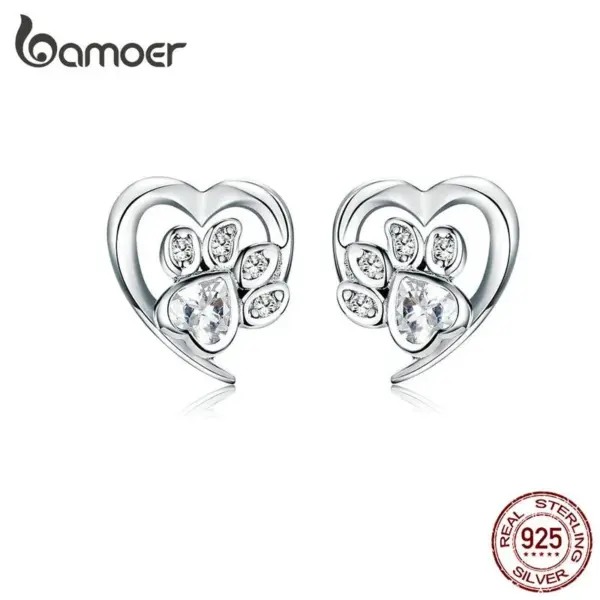 ca39be58047bc5e6b60bd639 Brincos Pegadas com Coração