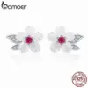 cba2b0b3b91a3077f80c1338 Brincos Flor de Concha