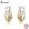 d61475a1567ccddbbda14840 Brincos Bicolores