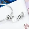 daca83b0f16e860ccae27b53 Berloque Charm Pérola Elegante