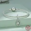e2e18cf95db49ee3a142c7b0 Berloque com Argola Rococó