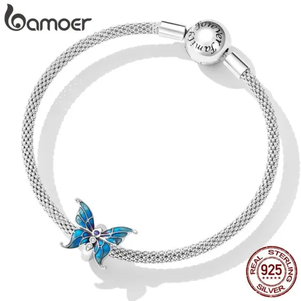 f83a03a120b7a90e8284d6f6 Pingente Borboleta Azul
