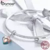 f9dc14a1c56d6b8956552406 Berloque com Argola A chave do coração