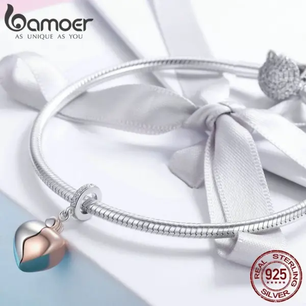 f9dc14a1c56d6b8956552406 Berloque com Argola A chave do coração