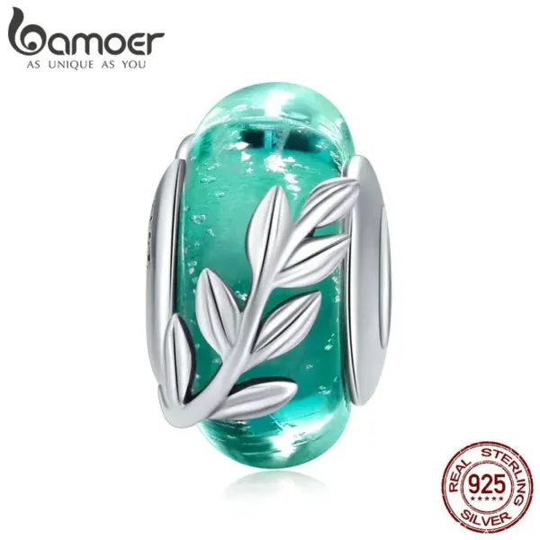 fa2ee446fffa3ad28455d7ec Berloque Folhas do Verão
